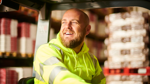 fork lift truck driver in warehouse