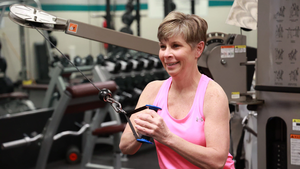 Woman using cable machine at Bellin Health Fitness Center, Oconto