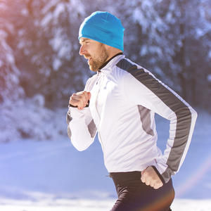 Man jogging in winter nature