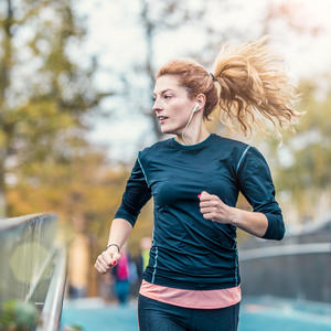 Female athlete running outdoors